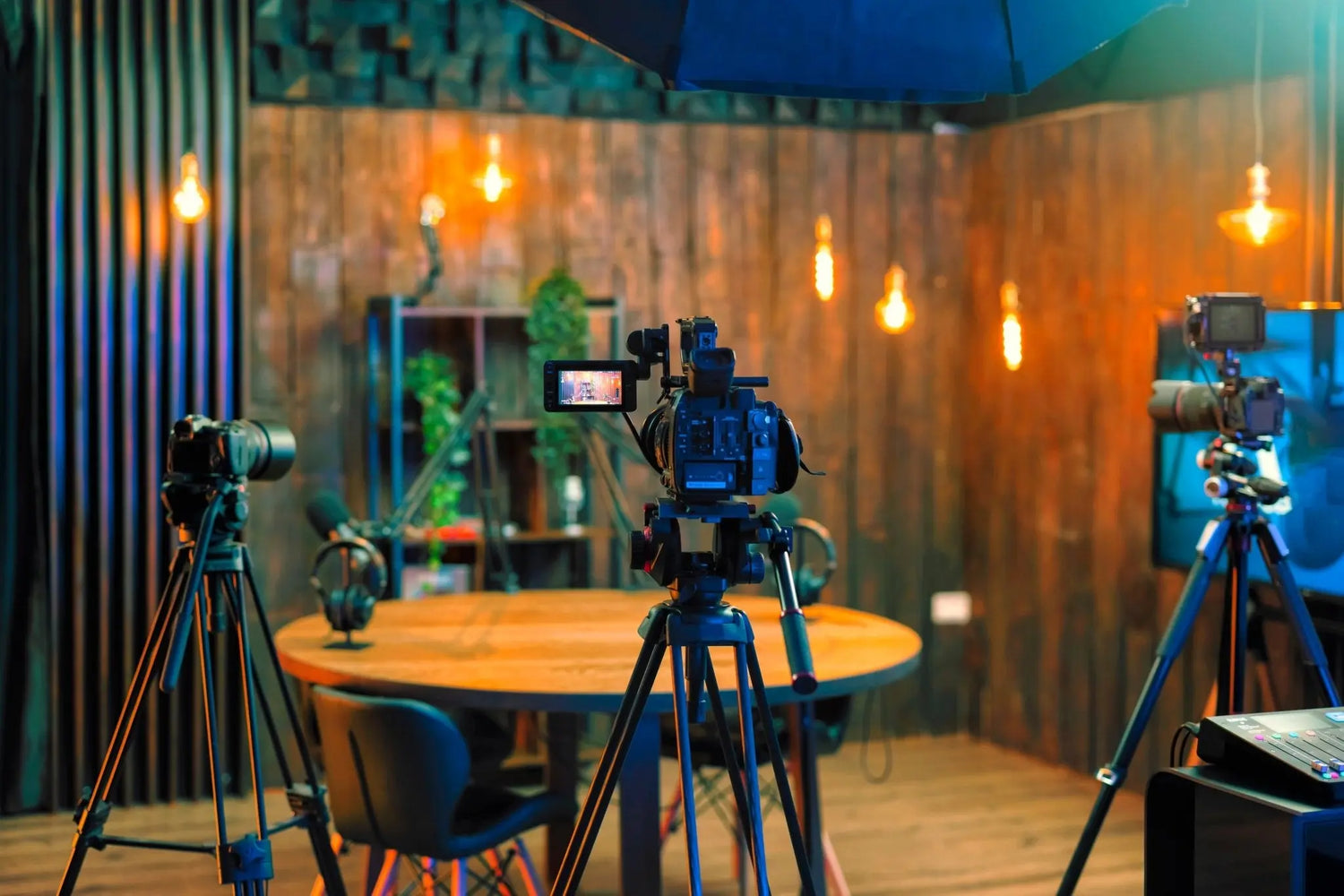 Professional cinema camera and studio lighting setup for high-end production.